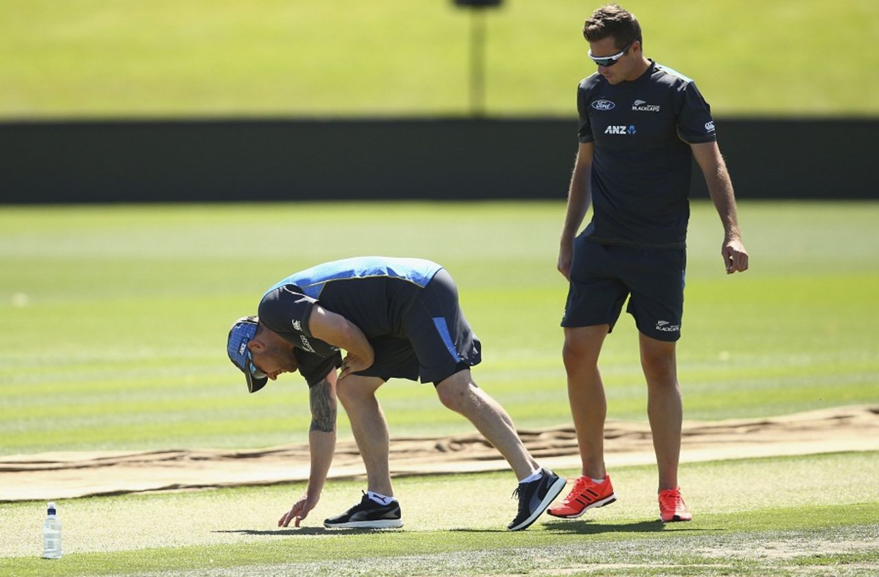 Brendon McCullum and Tim Southee inspect the Hagley Oval pitch, Christchurch, February 19, 2016