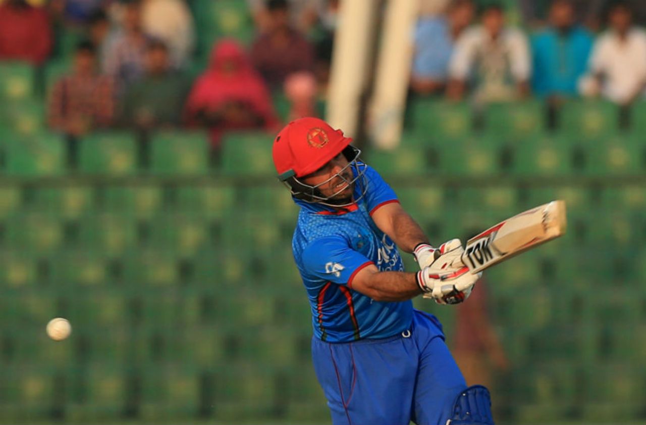 Karim Sadiq goes hard at a delivery during his 72, Afghanistan v United Arab Emirates, Asia Cup, Qualifying Group, Fatullah, February 19, 2016