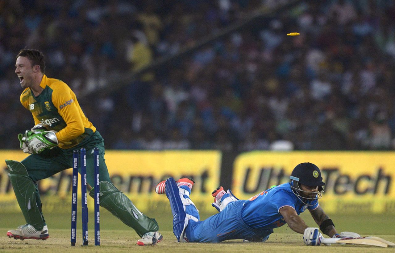 Virat Kohli was run-out on his first ball after AB de Villiers breaks the stumps, India v South Africa, 2nd T20I, Cuttack, October 5, 2015