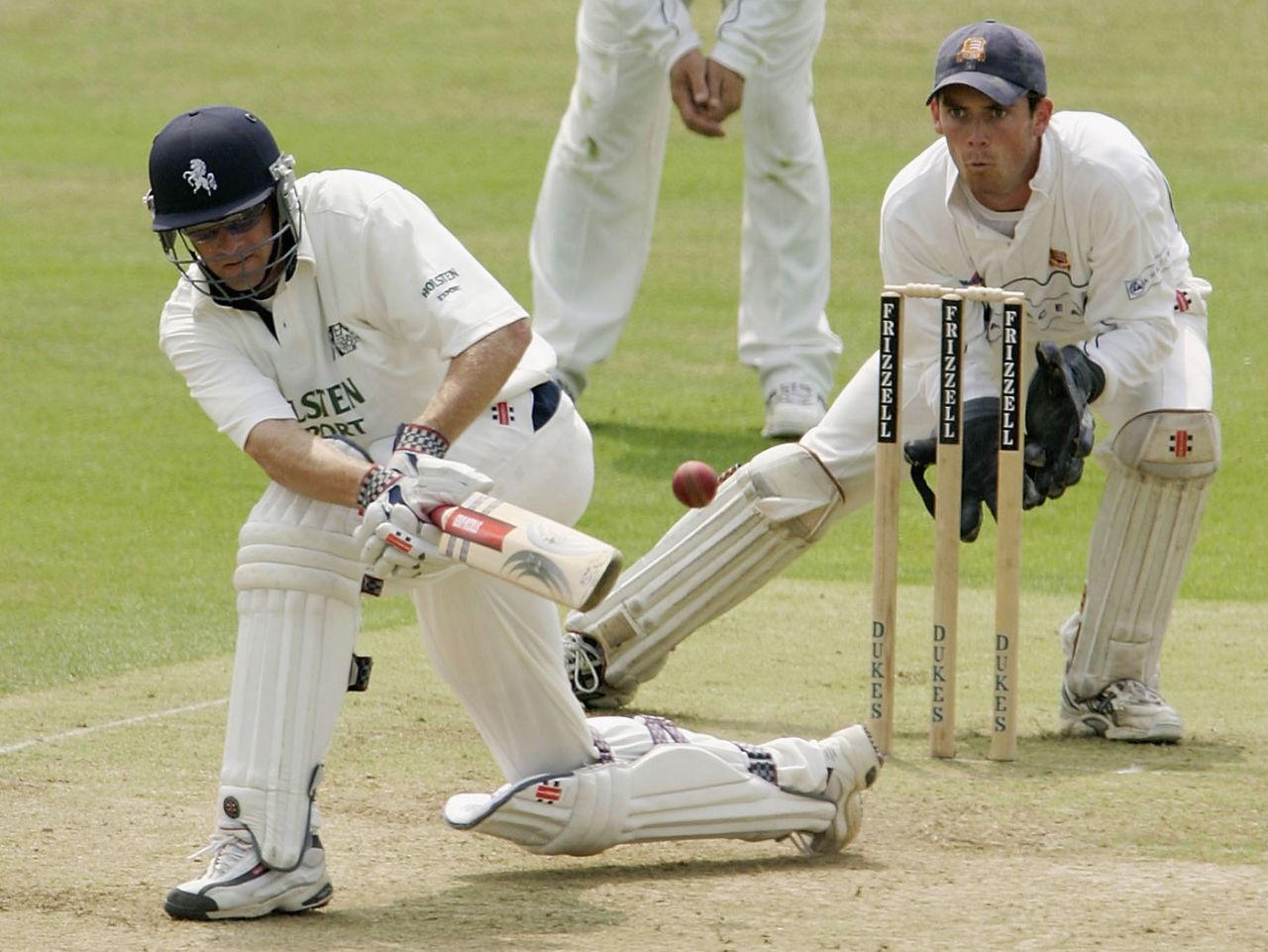 Wicketkeeper James Foster watches batsman David Fulton try to sweep a ball, Essex v Kent, County Championship Division One, Chelmsford, 1st day, June 27, 2003