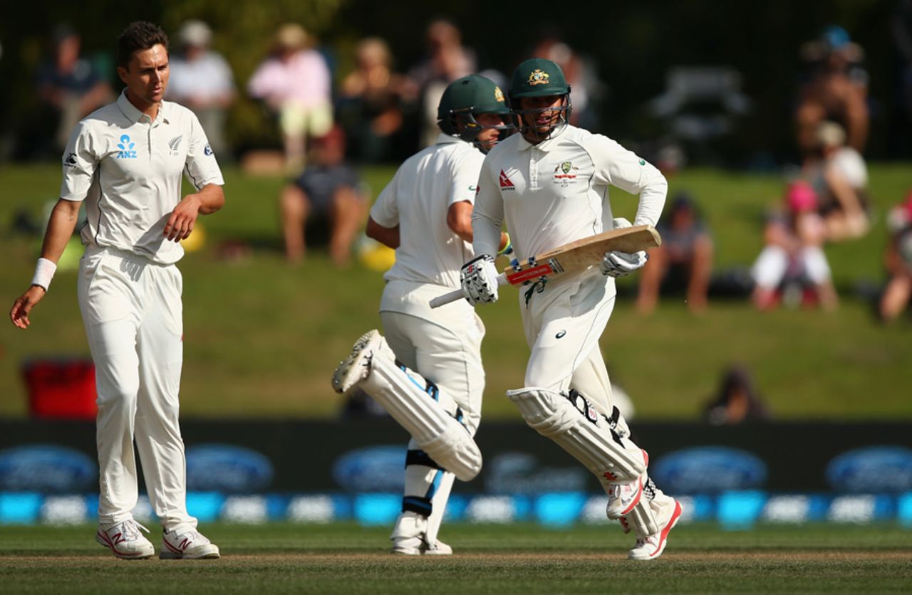 Usman Khawaja and Joe Burns take a run as Trent Boult looks on, New Zealand v Australia, 2nd Test, Christchurch, 5th day, February 24, 2016