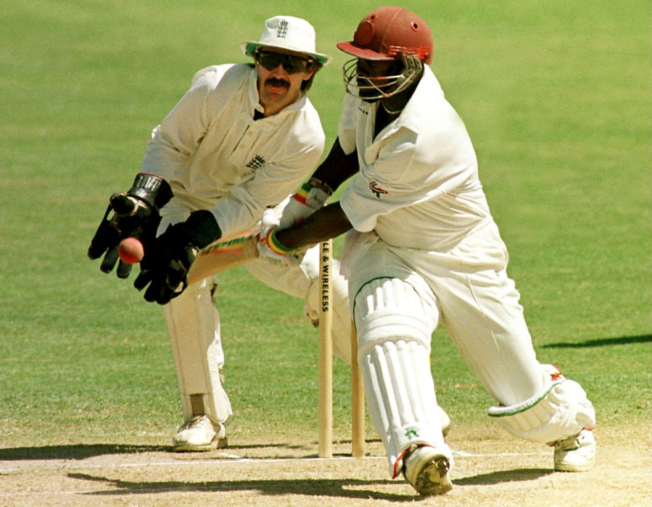 Jack Russell moves down leg side to catch the ball as Clayton Lambert tries to sweep, West Indies v England, 6th Test, St John's, 3rd day, March 22, 1998