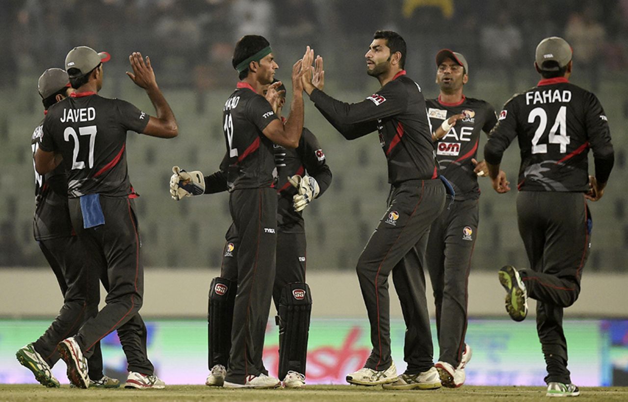 UAE gather around to celebrate the fall of a wicket, Bangladesh v UAE, Asia Cup 2016, Mirpur, February 26, 2016