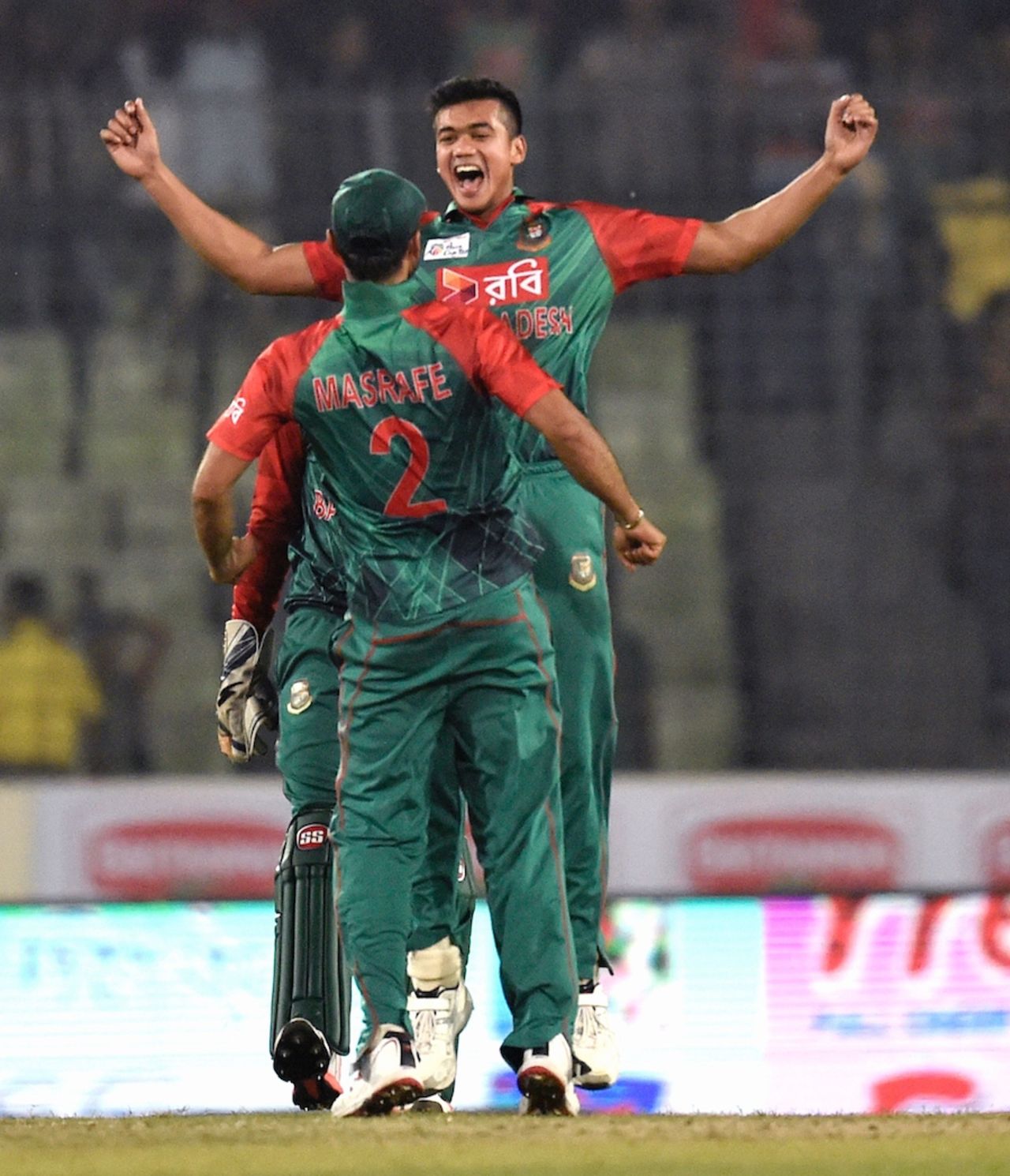 Mashrafe Mortaza and Taskin Ahmed celebrate with a chest bump, Bangladesh v UAE, Asia Cup 2016, Mirpur, February 26, 2016