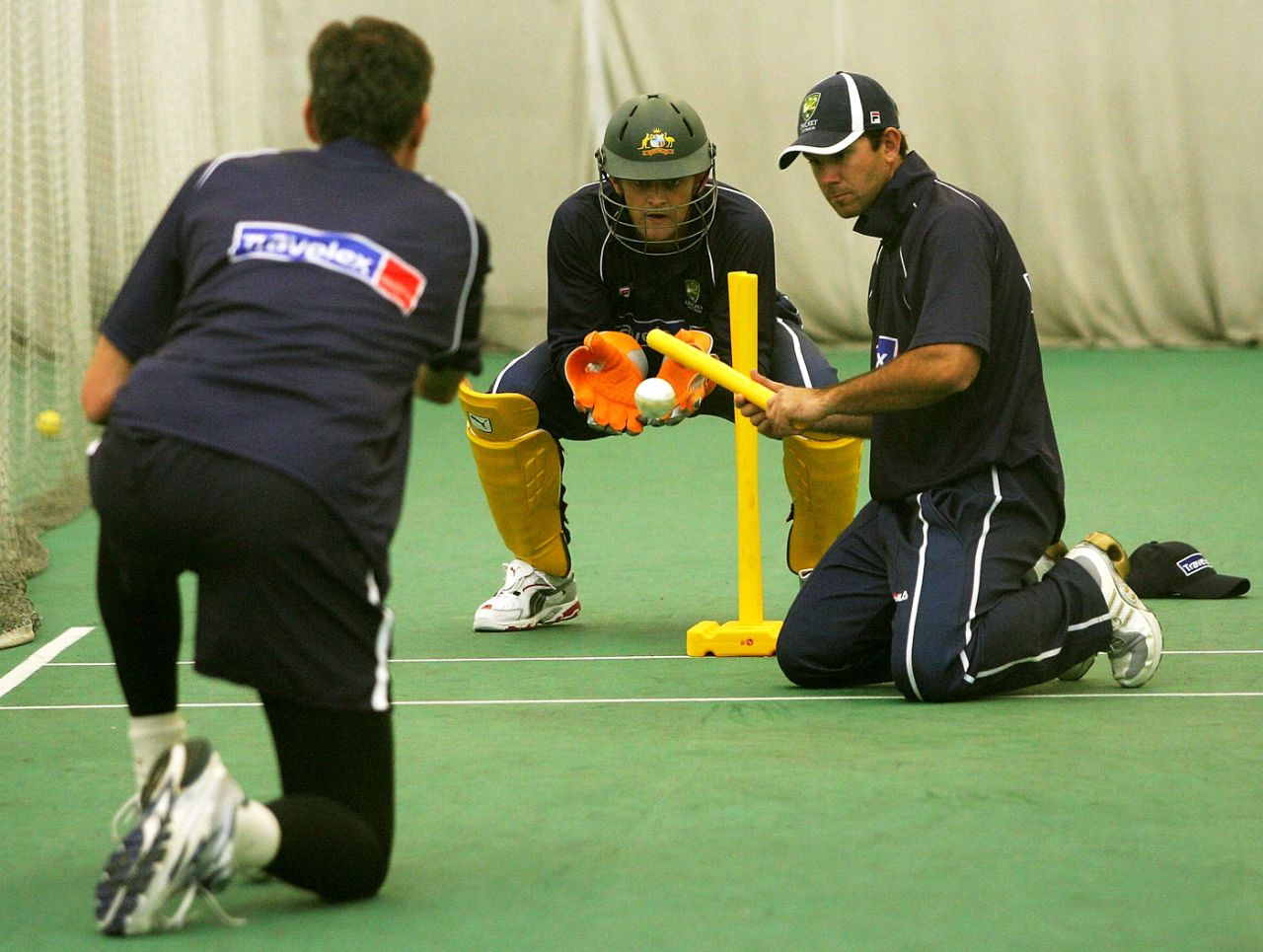 John Buchanan, Ricky Ponting and Adam Gilchrist train in the indoor nets in Cardiff, June 16, 2005