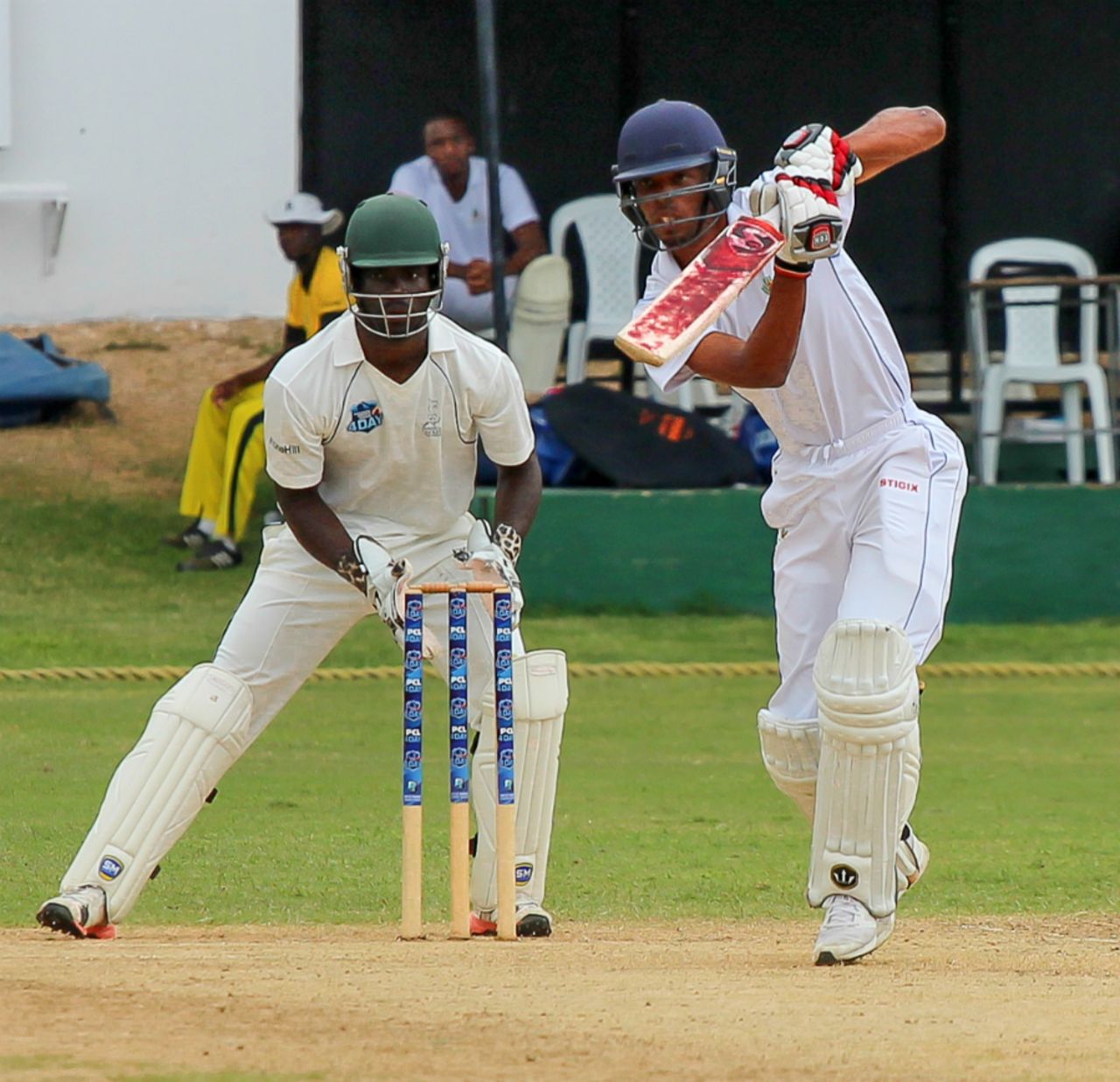 Chadwick Walton looks on as Roston Chase sends one through the covers, Jamaica v Barbados, Regional 4-Day Tournament, Kingston, 2nd day, February 27, 2016 