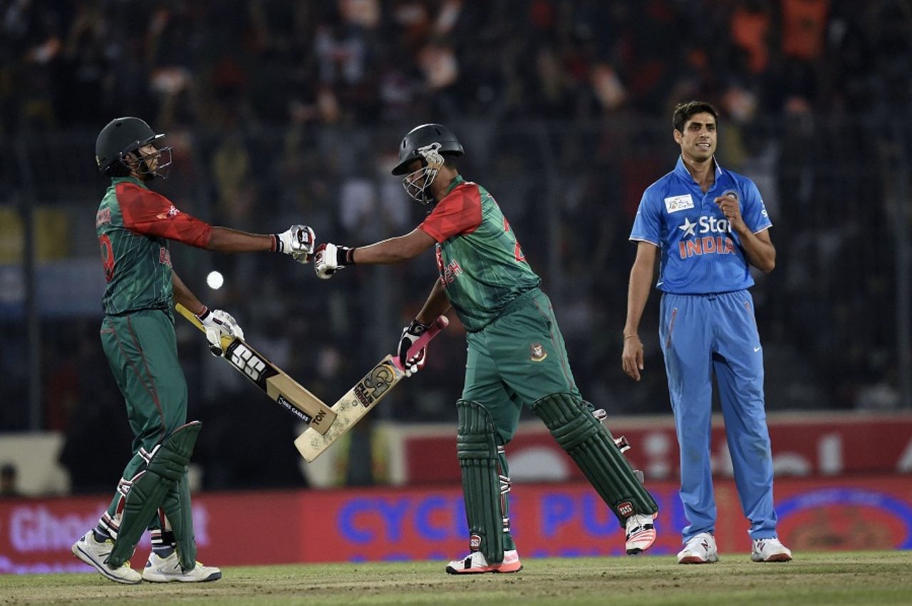 Tamim Iqbal and Soumya Sarkar touch bat and gloves during their opening stand, Bangladesh v India, Asia Cup final, Mirpur, March 6, 2016