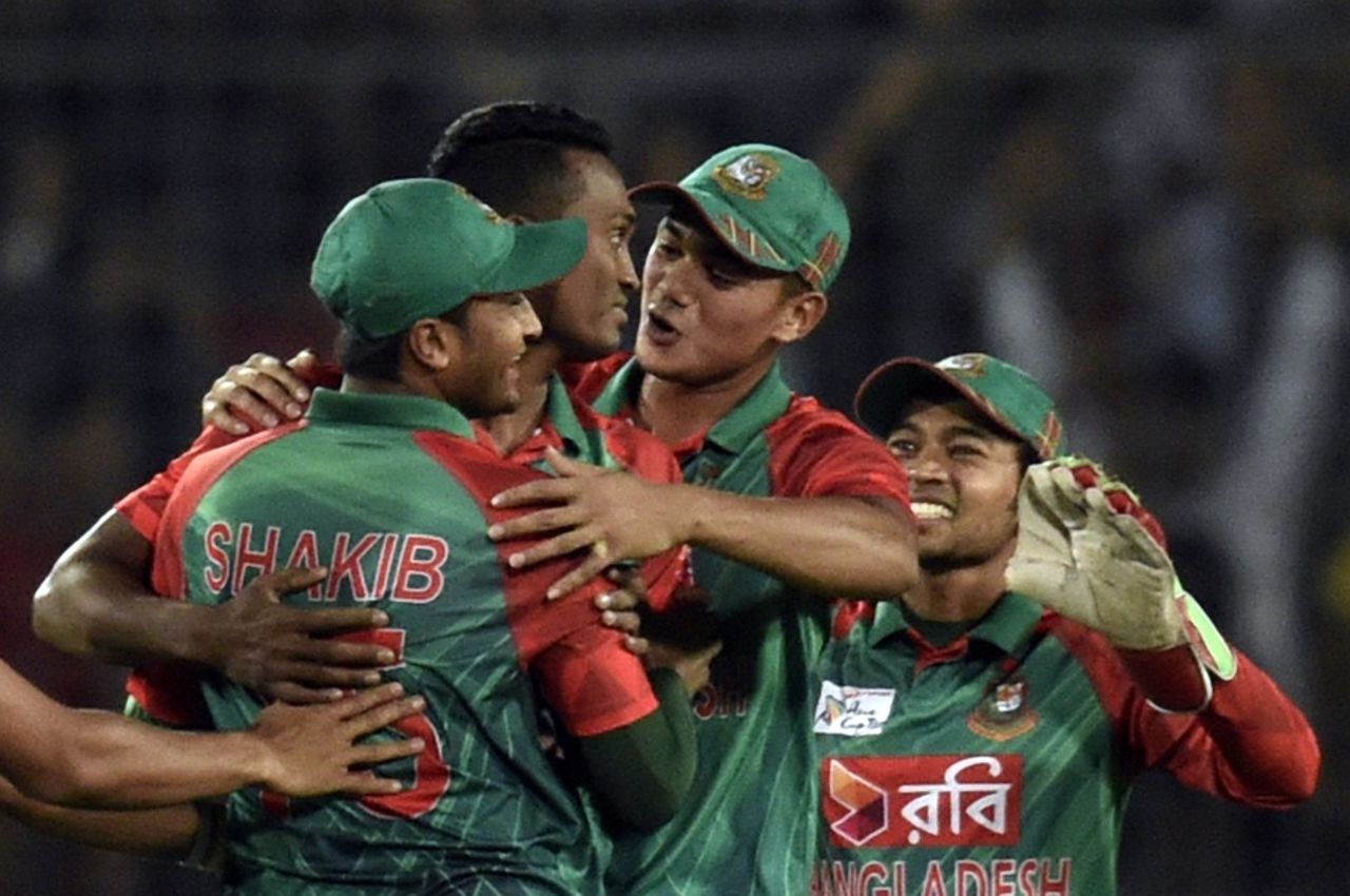 Al-Amin Hossain celebrates Rohit Sharma's wicket with his team-mates,  Bangladesh v India, Asia Cup final, Mirpur, March 6, 2016 
