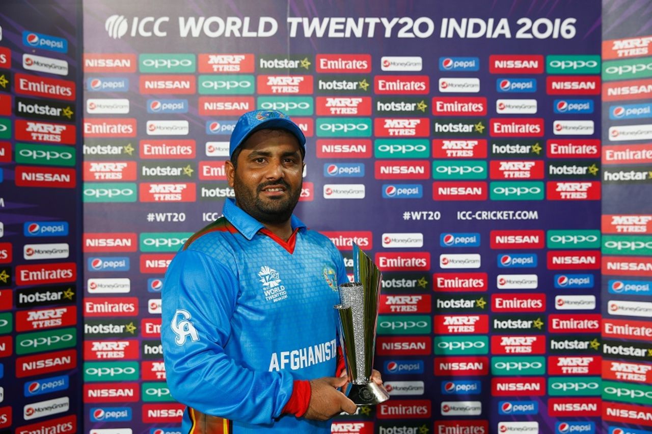 Mohammad Shahzad poses with the Man of the Match trophy, Afghanistan v Scotland, World T20 qualifier, Group B, Nagpur, March 8, 2016