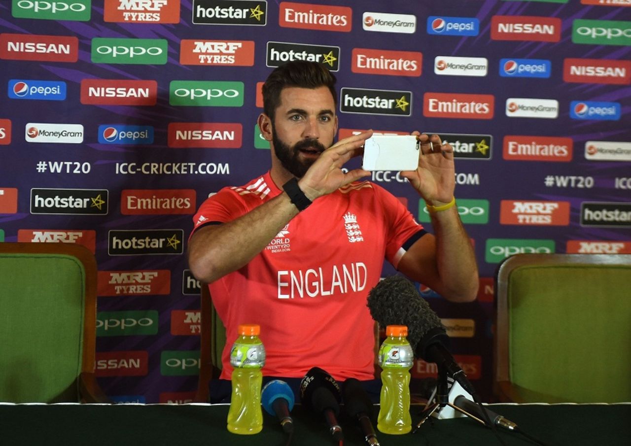 Liam Plunkett takes a photo at England's press conference, Mumbai, March 9, 2016
