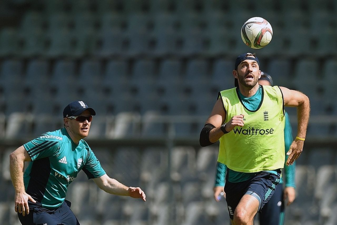 Liam Plunkett and Eoin Morgan play football during an England practice session, Mumbai, March 10, 2016
