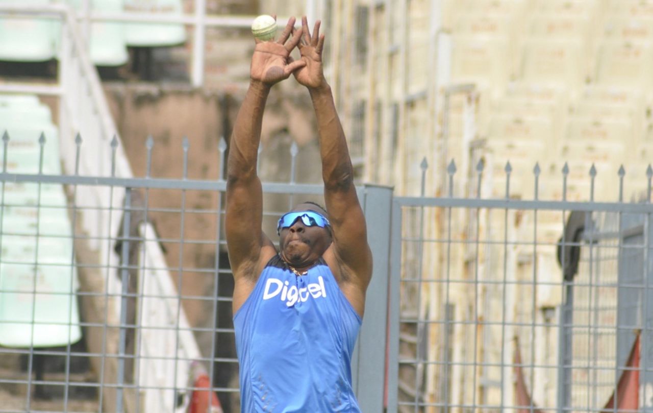 Dwayne Bravo attempts a high catch during West Indies training, Kolkata, March 9, 2016
