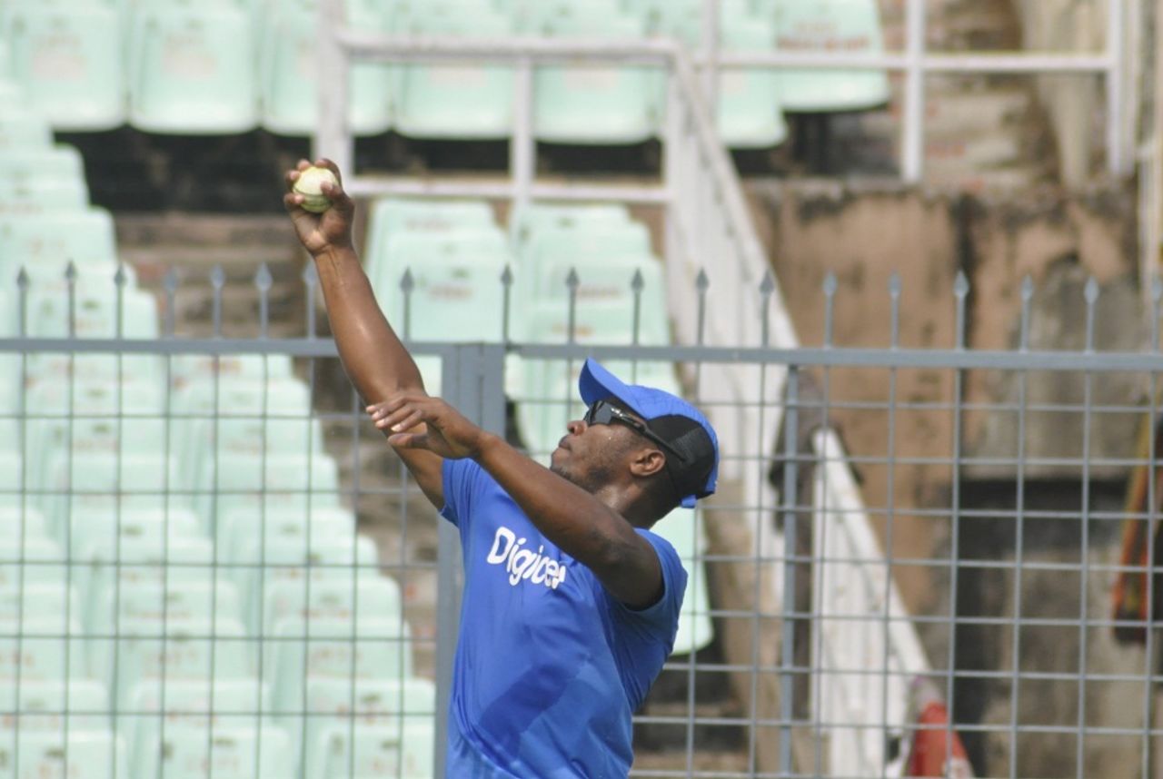 Johnson Charles completes a one-handed catch during West Indies training, Kolkata, March 9, 2016