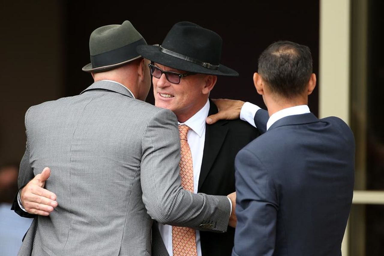 Jeff Crowe greets mourners at the funeral for his brother Martin Crowe, Auckland, March 11, 2016