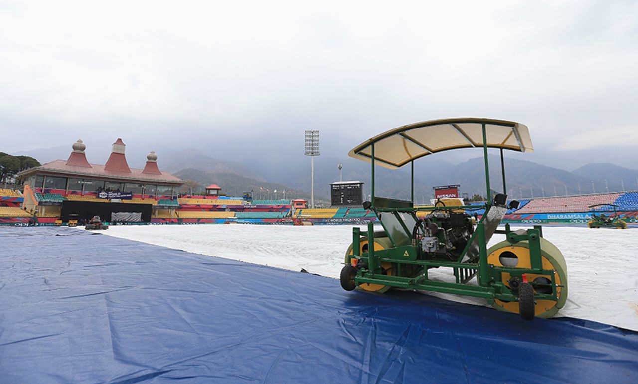 A super sopper is parked over the covered outfield at the HPCA stadium, Netherlands v Oman, World T20 qualifier, Group A, Dharamsala, March 11, 2016