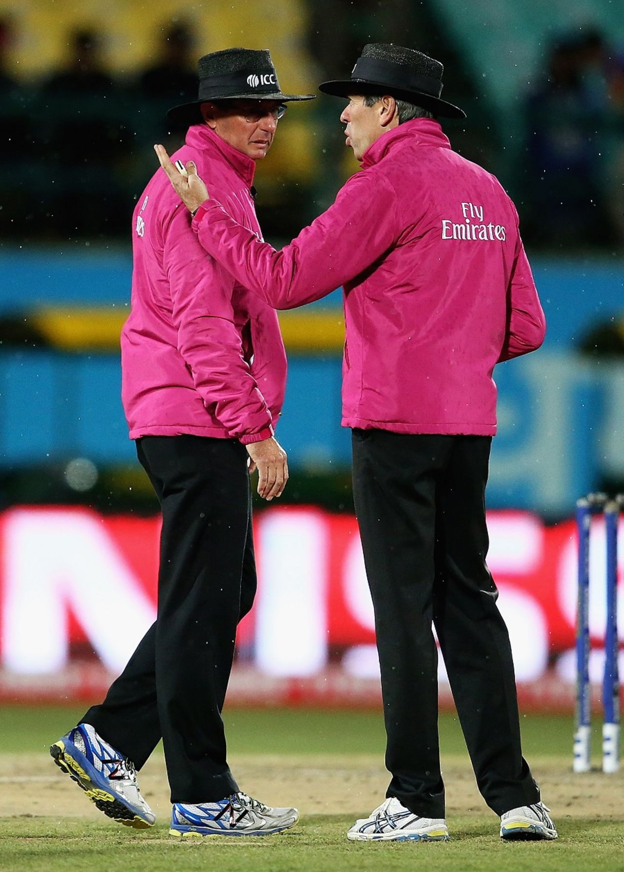 Umpires Rod Tucker and Nigel Llong have a chat as the rain comes down, Bangladesh v Ireland, World T20 qualifier, Group A, Dharamsala, March 11, 2016