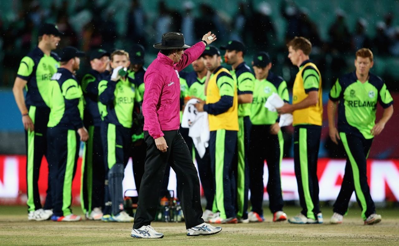 Nigel Llong asks the Ireland players to walk off the field, Bangladesh v Ireland, World T20 qualifier, Group A, Dharamsala, March 11, 2016