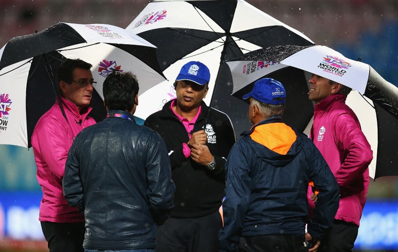 Match umpires have a chat with the groundstaff as rain stops play, Bangladesh v Ireland, World T20 qualifier, Group A, Dharamsala, March 11, 2016