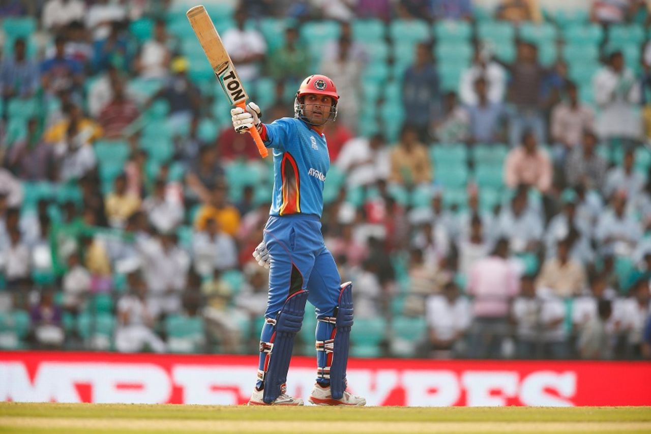 Mohammad Nabi acknowledges his fifty, Afghanistan v Zimbabwe, World T20 qualifiers, Group B, Nagpur, March 12, 2016
