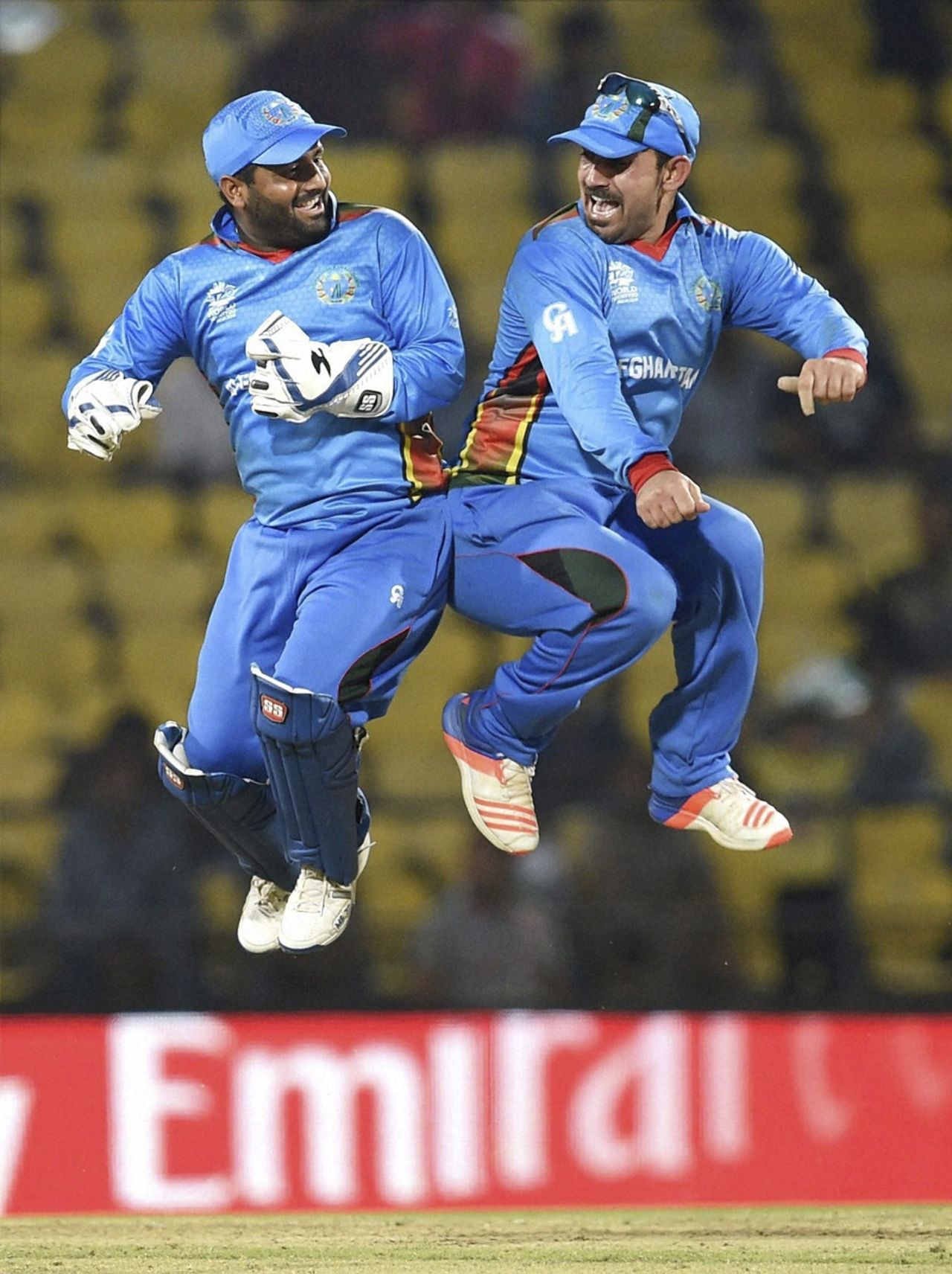 Mohammad Shahzad and Samiullah Shenwari celebrate Afghanistan's win, Afghanistan v Zimbabwe, World T20 qualifiers, Group B, Nagpur, March 12, 2016