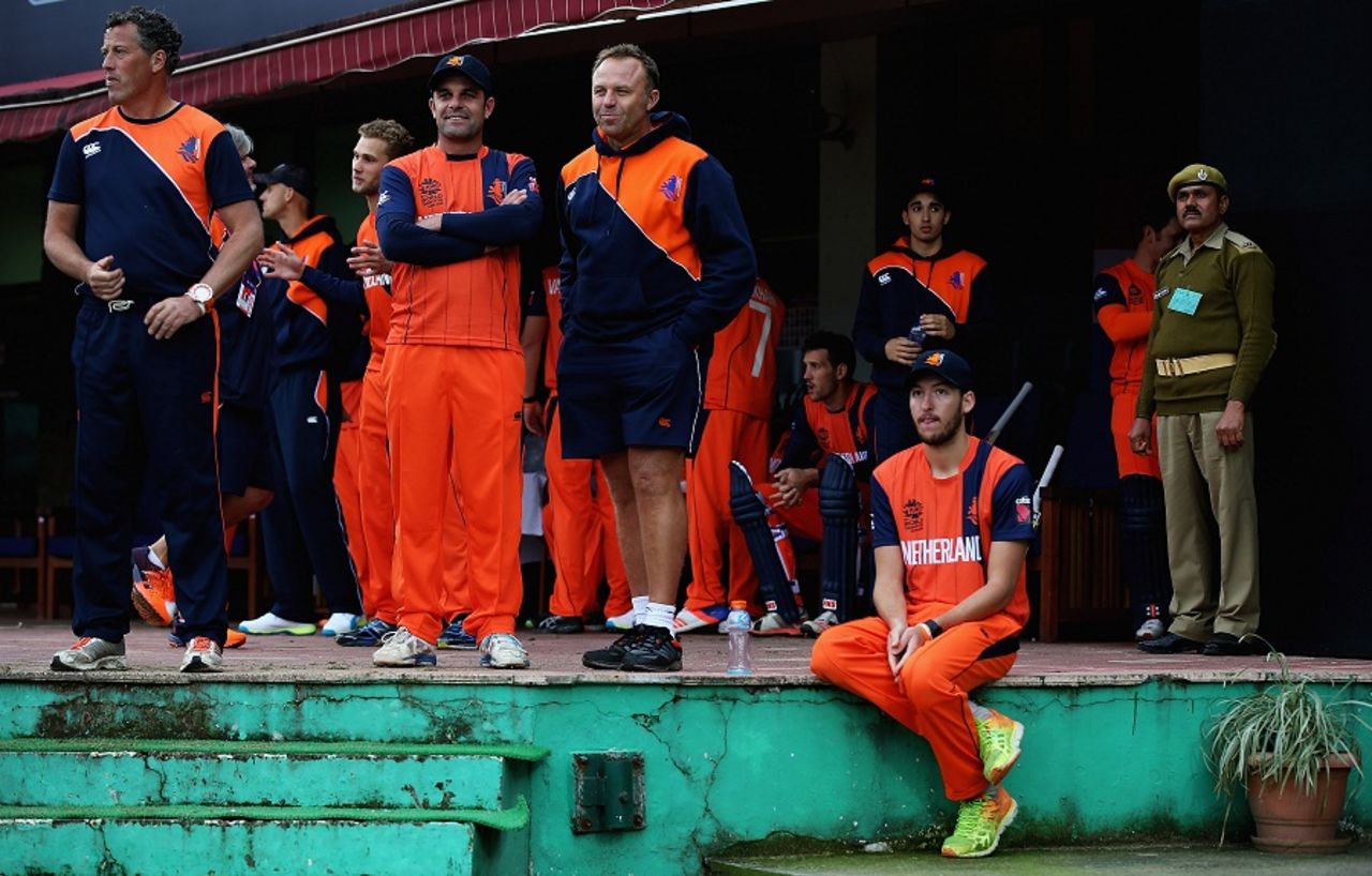 Netherlands' players look on from the dressing room during the rain interruption,  Ireland v Netherlands, World T20 qualifiers, Group A, March 13, 2016