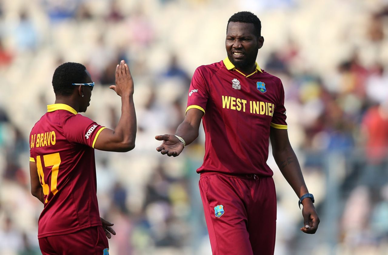 Sulieman Benn is congratulated after picking up a wicket, Australia v West Indies, World T20 warm-ups, Kolkata, March 13, 2016