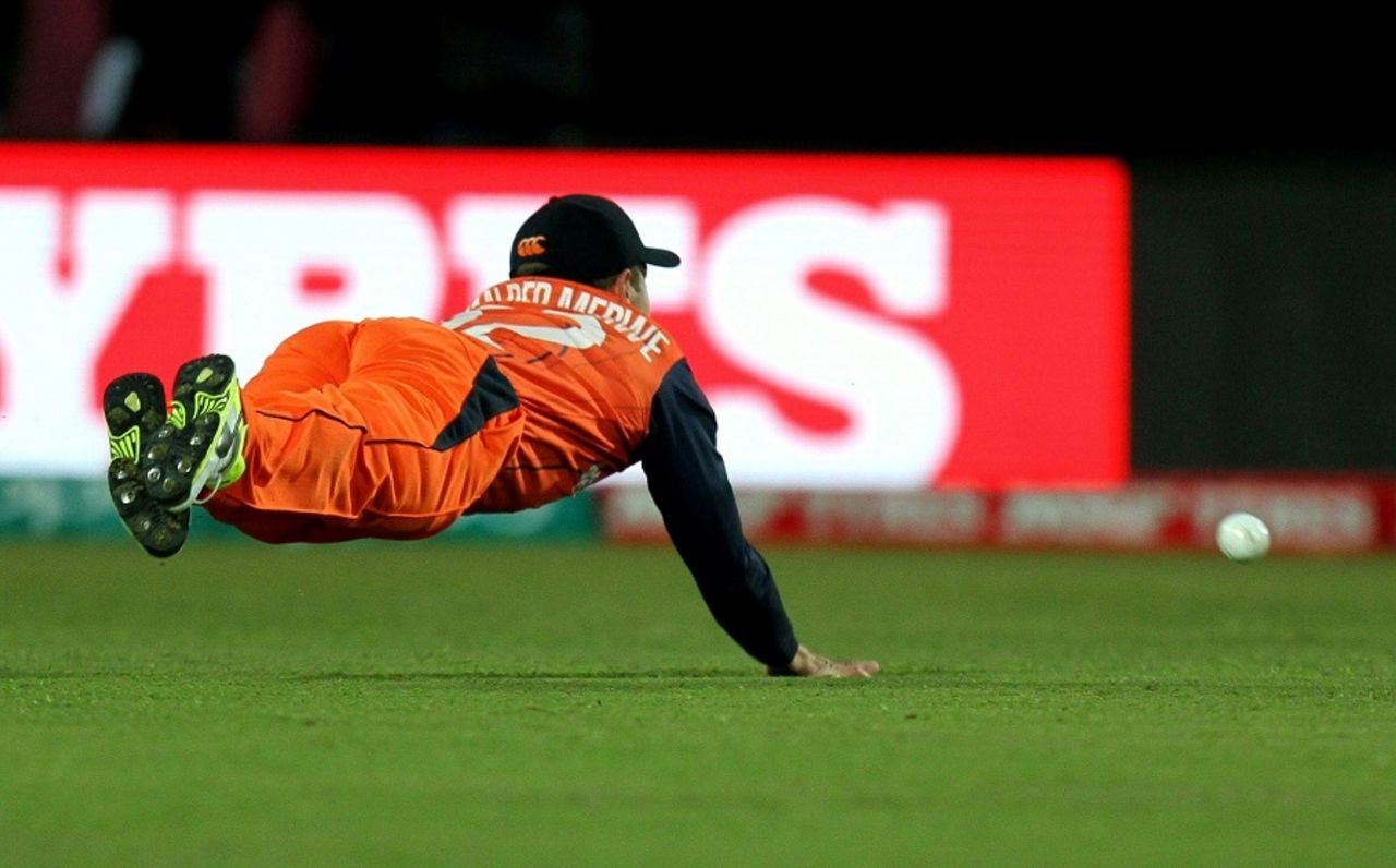 Roelof van der Merwe dives to stop the ball, Ireland v Netherlands, World T20 qualifiers, Group A, Dharamsala, March 13, 2016