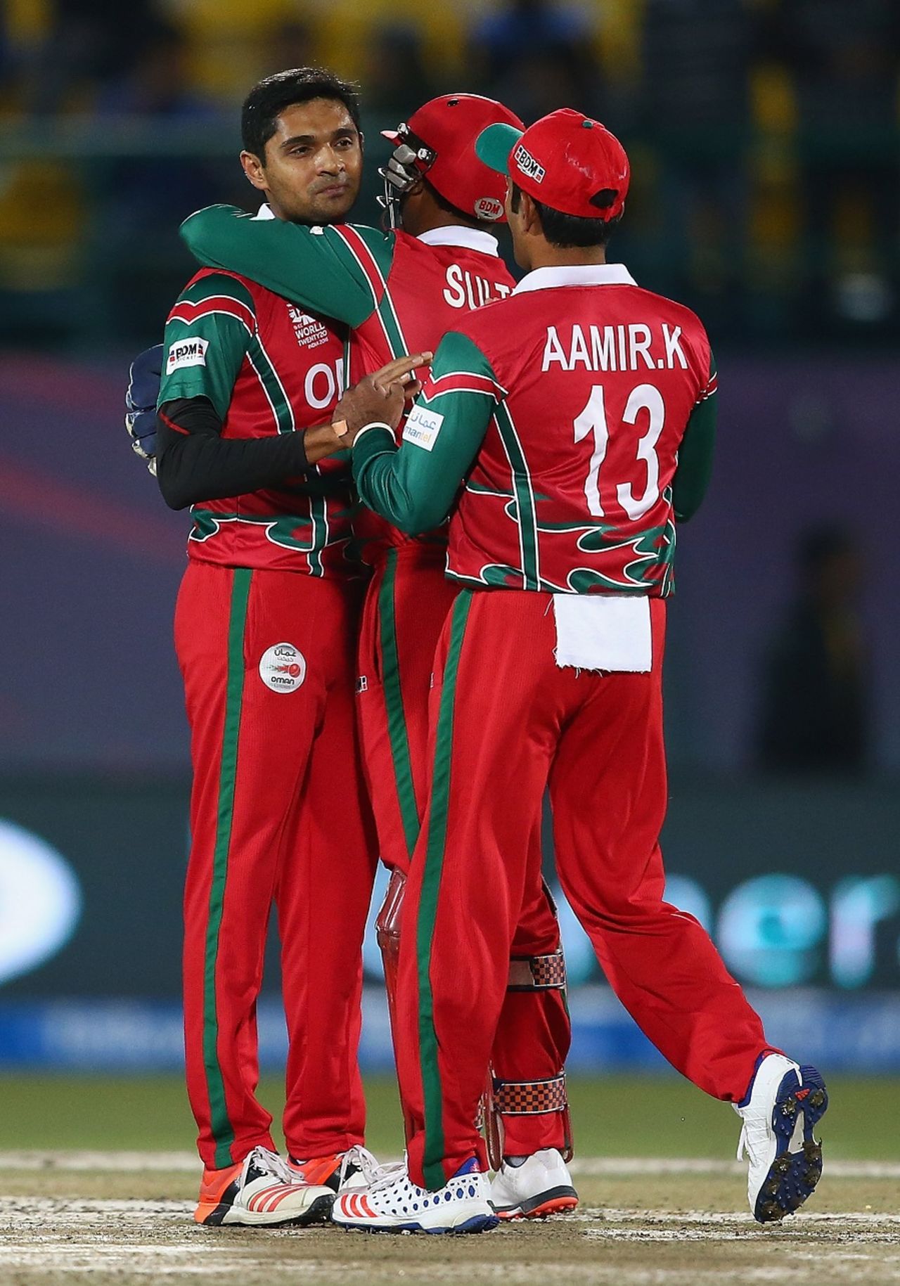 Ajay Lalcheta and team-mates come together at the fall of a wicket, Bangladesh v Oman, World T20 qualifiers, Group A, Dharamsala, March 13, 2016