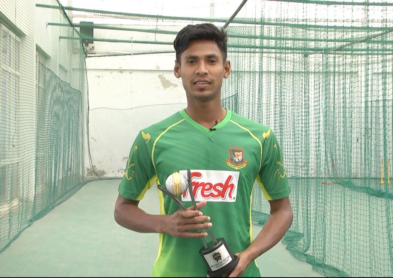 Mustafizur Rahman holds his ESPNcricinfo Awards trophy for the Debutant of the Year, March 2016