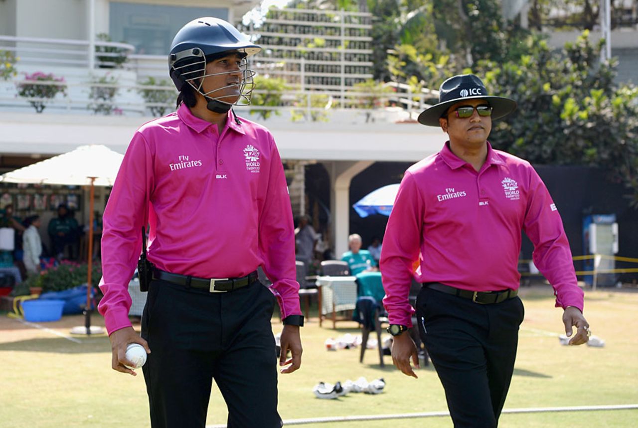 Umpire Pashchim Pathak takes the field wearing a helmet, Mumbai Cricket Association XI v England XI, World T20 warm-ups, Mumbai, March 14, 2016