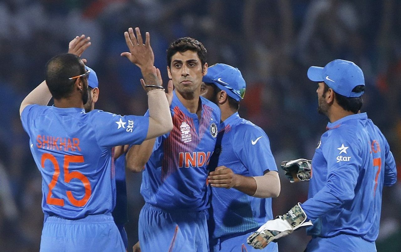 Ashish Nehra celebrates Colin Munro's wicket with his team-mates, India v New Zealand, World T20 2016, Group 2, Nagpur, March 15, 2016 