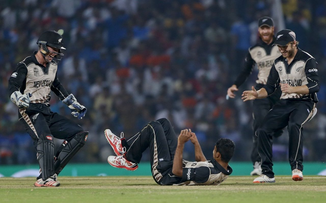 New Zealand players gather around Ish Sodhi to celebrate a wicket, India v New Zealand, World T20 2016, Group 2, Nagpur, March 15, 2016 