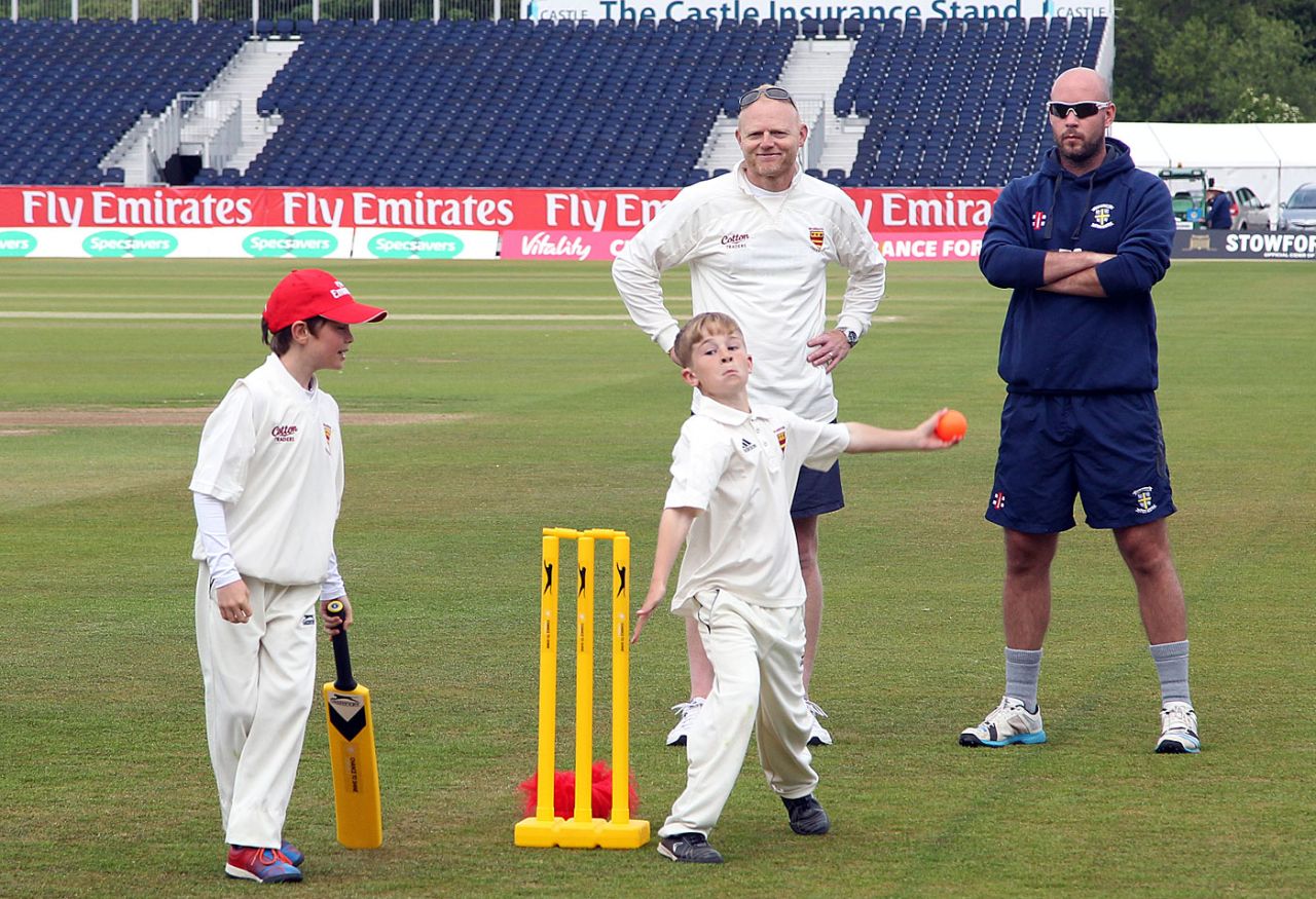 Kids take part in a coaching session with Durham's Chris Rushworth, Chester-le-Street, June 12, 2015  