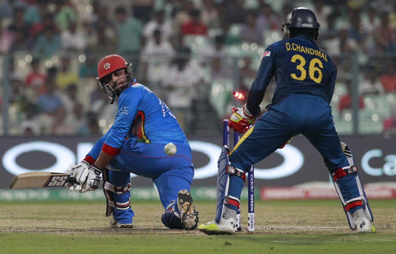 Noor Ali Zadran is bowled around his legs, Afghanistan v Sri Lanka, World T20 2016, Group 1, Kolkata