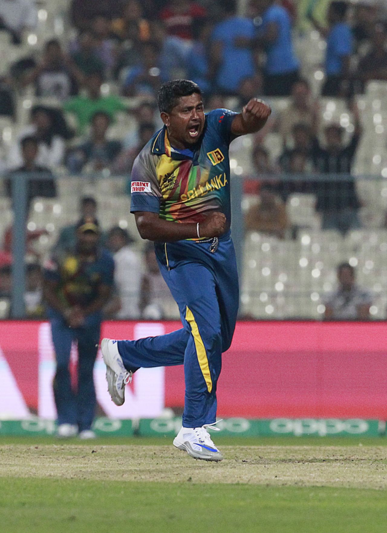 Rangana Herath roars in delight after picking up a wicket, Afghanistan v Sri Lanka, World T20 2016, Group 1, Kolkata