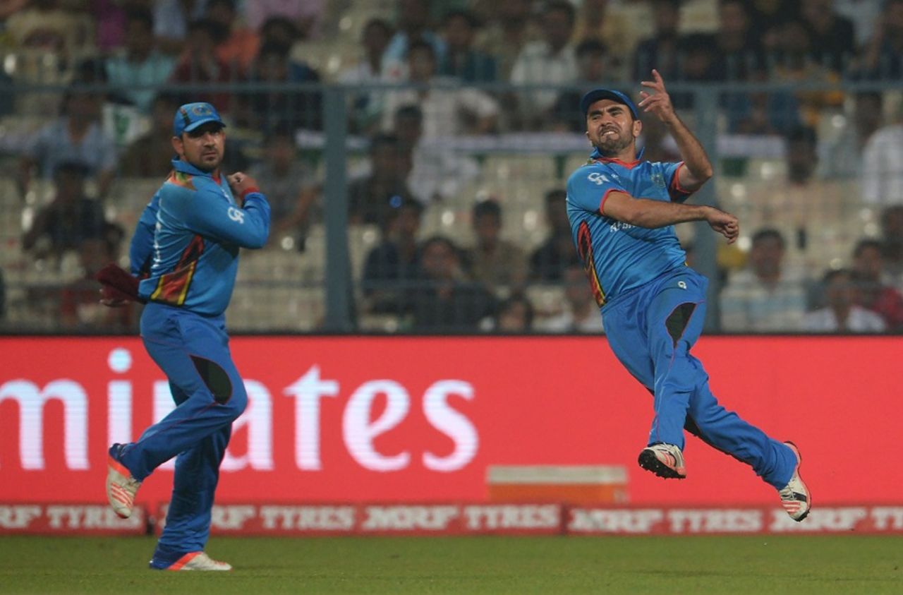 Karim Sadiq throws the ball, Afghanistan v Sri Lanka, World T20 2016, Group 1, Kolkata