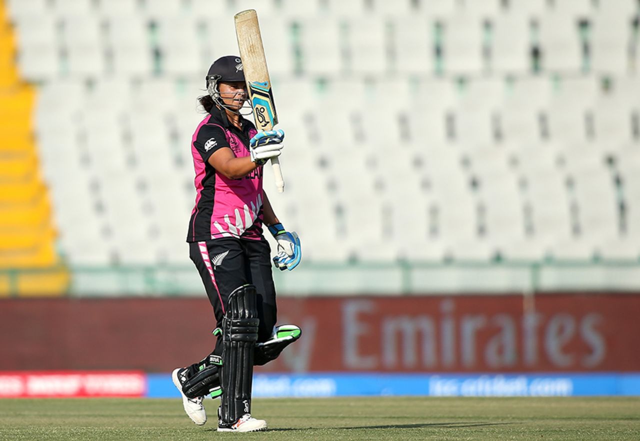 Suzie Bates raises her bat after reaching her 13th T20I fifty, Ireland v New Zealand, Women's World T20 2016, Group A, Mohali, March 18, 2016