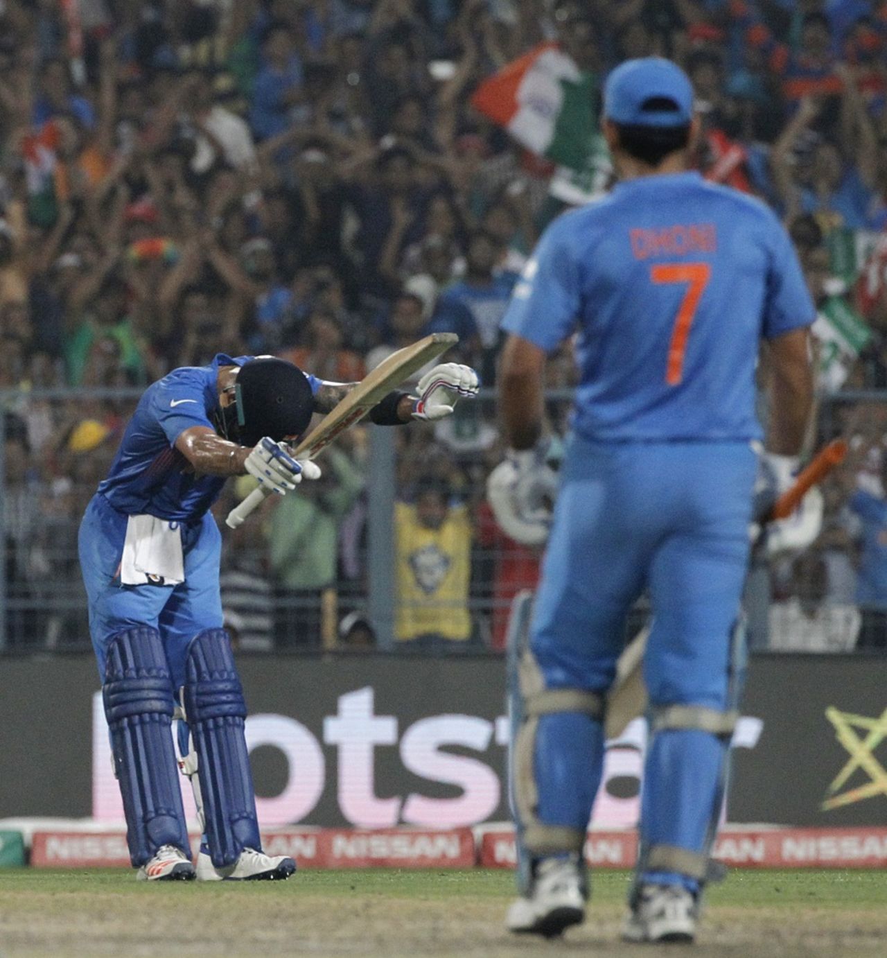 Virat Kohli takes a bow after reaching his fifty, India v Pakistan, World T20 2016, Group 2, Kolkata, March 19, 2016