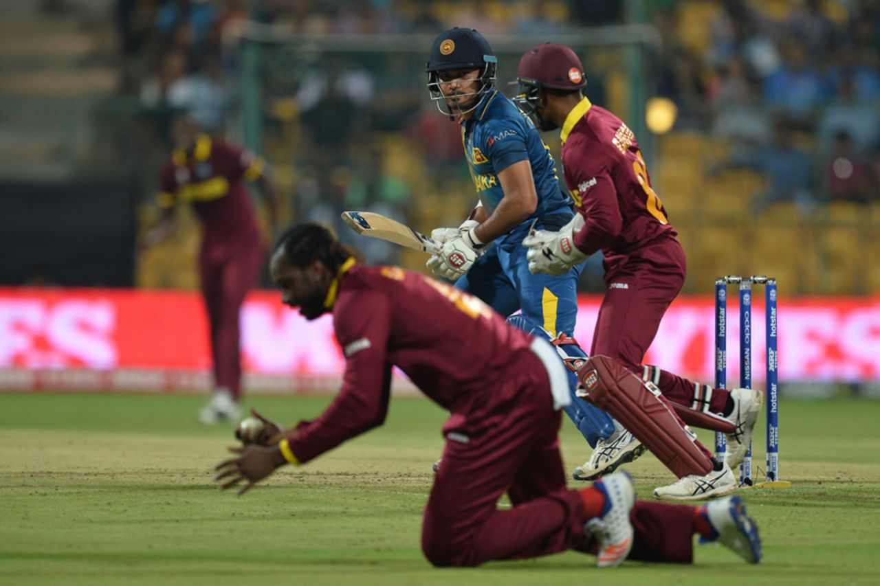 Chris Gayle clings on to a catch off Milinda Siriwardana's bat, Sri Lanka v West Indies, World T20 2016, Group 1, Bangalore, March 20, 2016