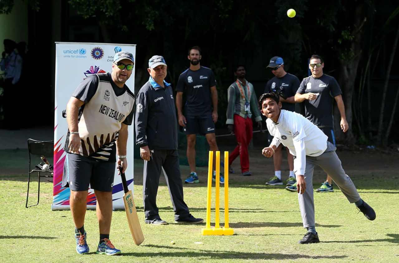 New Zealand players have a game with local children in Mohali at the ICC Cricket For Good and Team Swachh cricket clinic in partnership with UNICEF, March 21, 2016