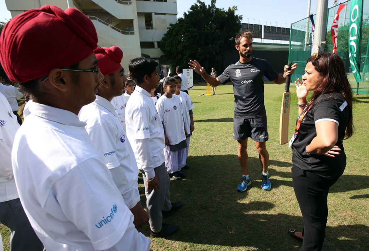 Grant Elliott dishes out advice to local children in Mohali at the ICC Cricket For Good and Team Swachh cricket clinic in partnership with UNICEF, March 21, 2016