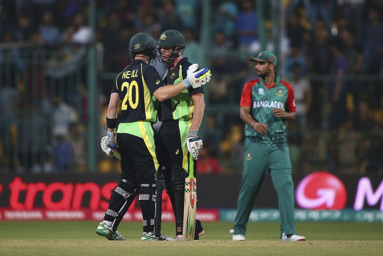 James Faulkner and Peter Nevill greet each other after sealing Australia's win, Australia v Bangladesh, World T20, Group 2, Bangalore, March 21, 2016