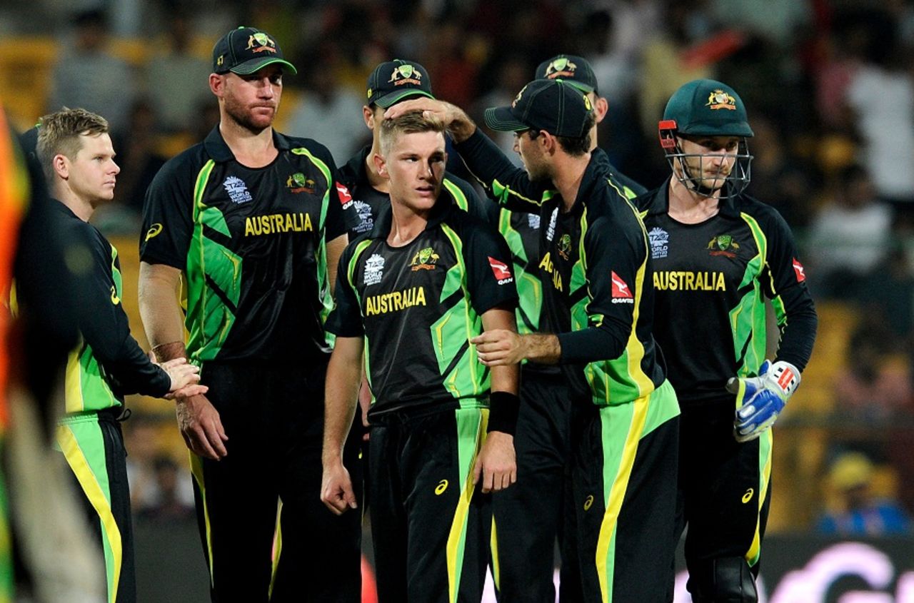 Adam Zampa is mobbed by his team-mates after picking up a wicket, Australia v Bangladesh, World T20, Group 2, Bangalore, March 21, 2016