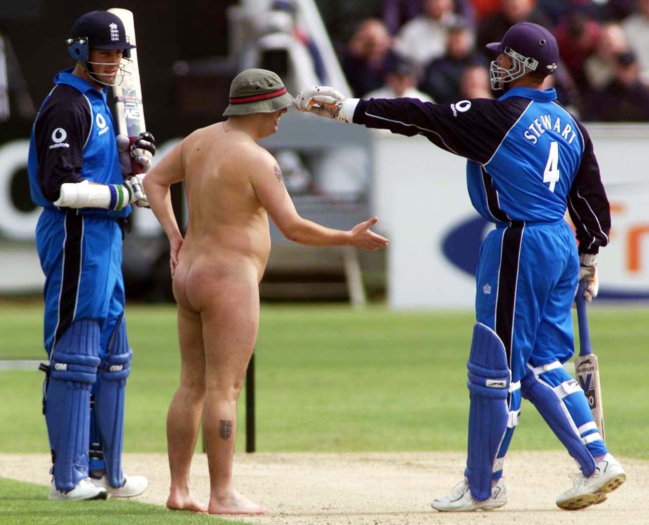A streaker greets Alec Stewart while Marcus Trescothick watches, England v Zimbabwe, Chester-le-Street, July 15, 2000