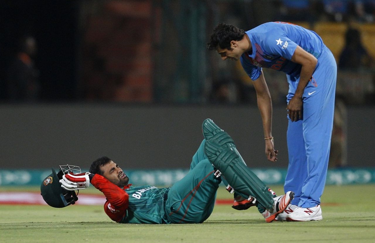 Tamim Iqbal and Ashish Nehra collided on the first ball of Bangladesh's innings, India v Bangladesh, World T20 2016, Group 2, Bangalore, March 23, 2016
