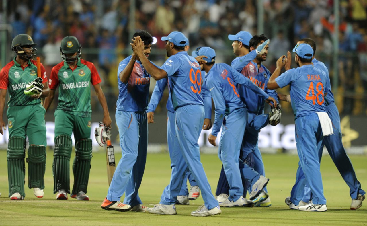 India celebrate while Bangladesh batsmen walk back distraught, India v Bangladesh, World T20 2016, Group B, Bangalore, March 23, 2016