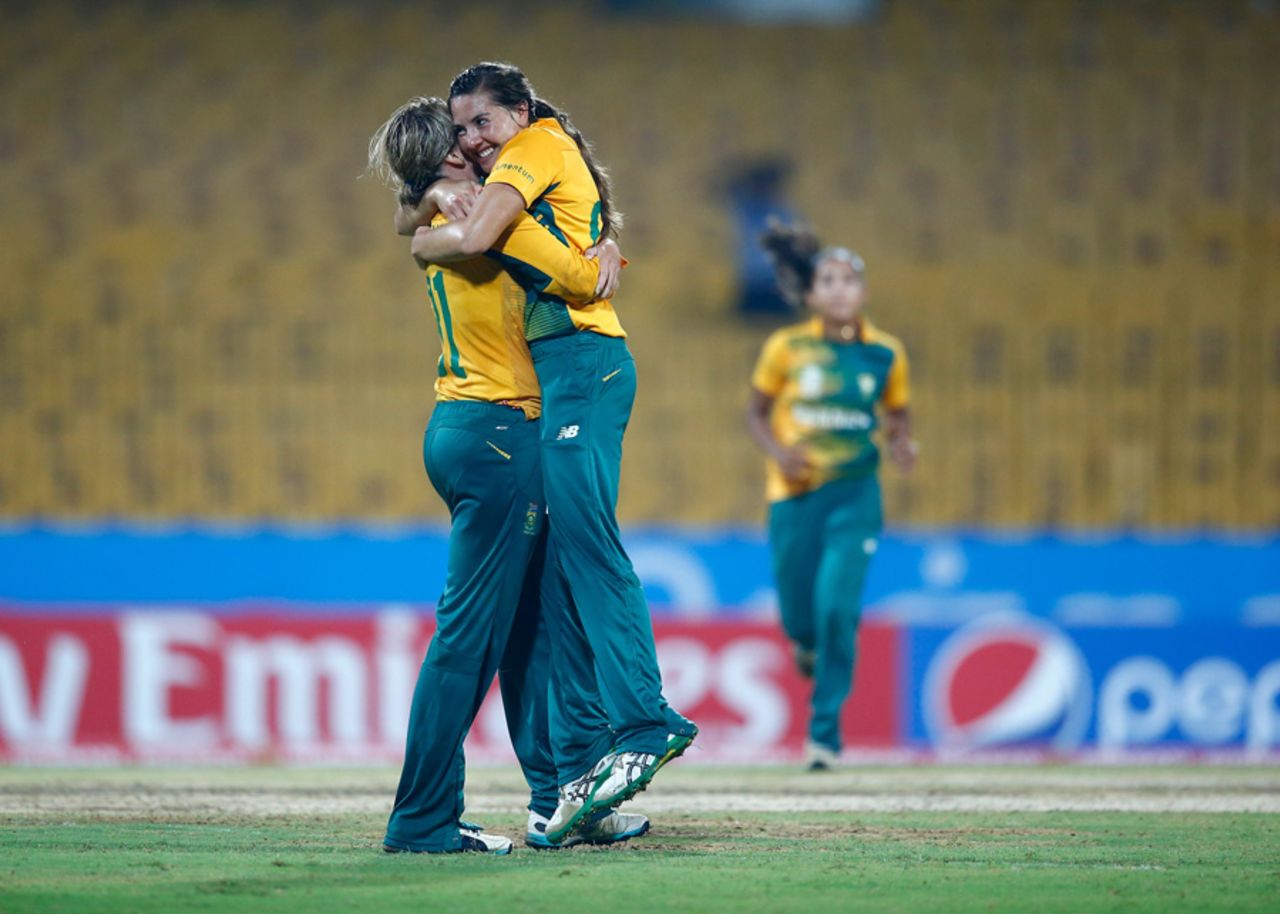 Sune Luus is congratulated by Dane van Niekerk after taking her fifth wicket, Ireland v South Africa, Women's World T20 2016, Group A, Chennai, March 23, 2016