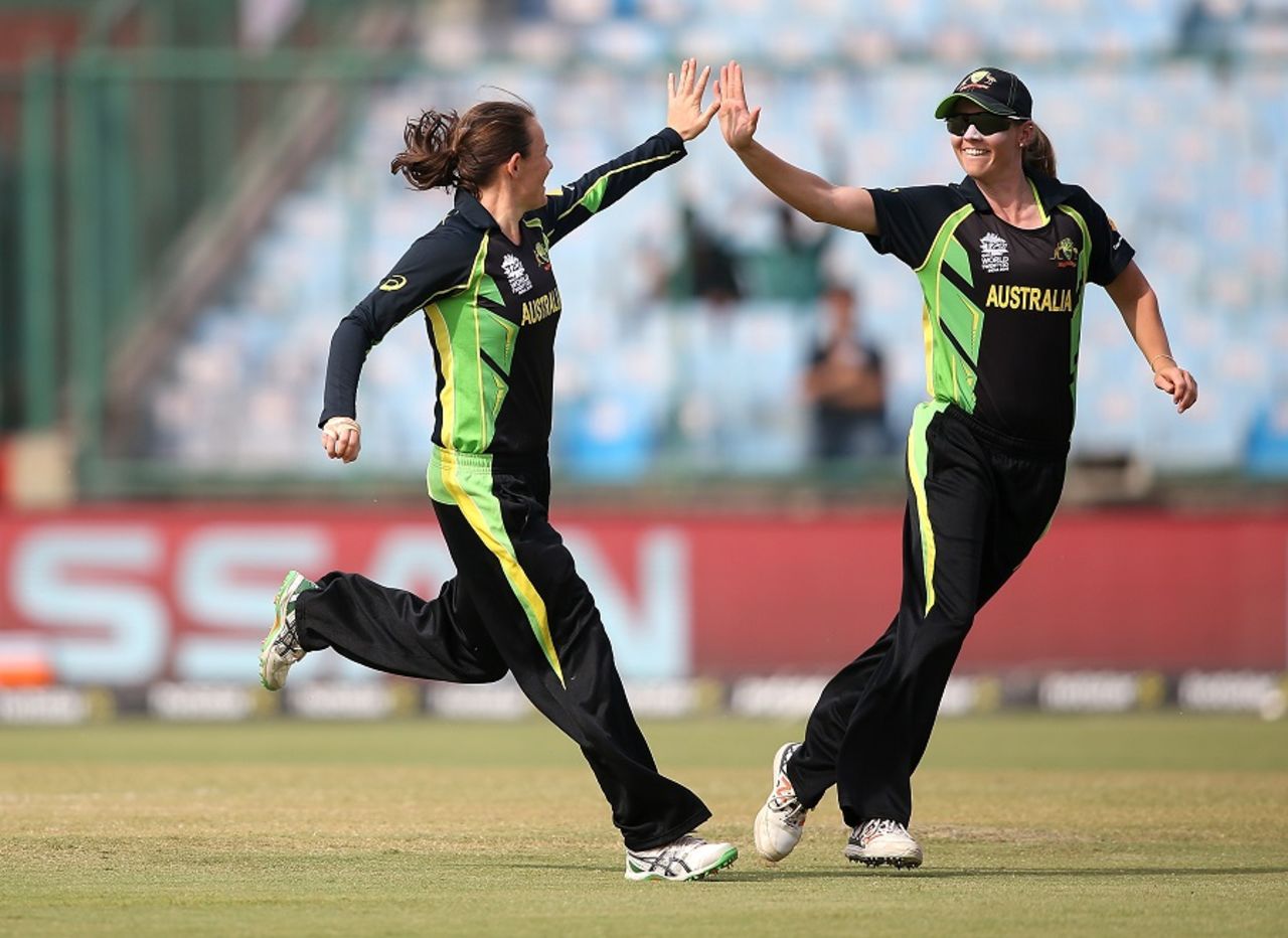 Erin Osborne and Meg Lanning celebrate after taking a wicket, Australia v Sri Lanka, Women's World T20 2016, Group A, Delhi, March 24, 2016