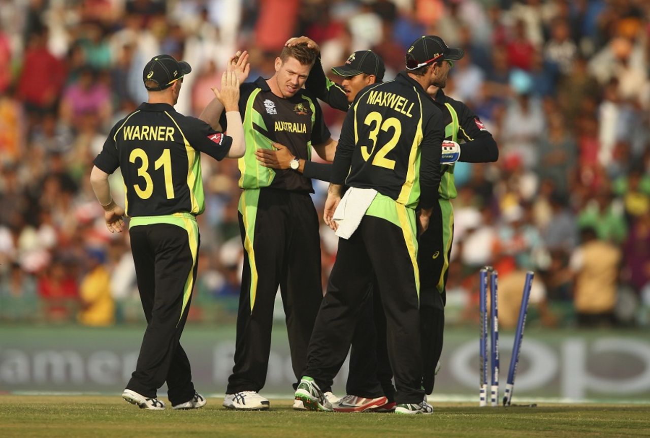 James Faulkner celebrates the wicket of Sharjeel Khan with his team-mates, Australia v Pakistan, World T20 2016, Group 2, Mohali, March 25, 2016