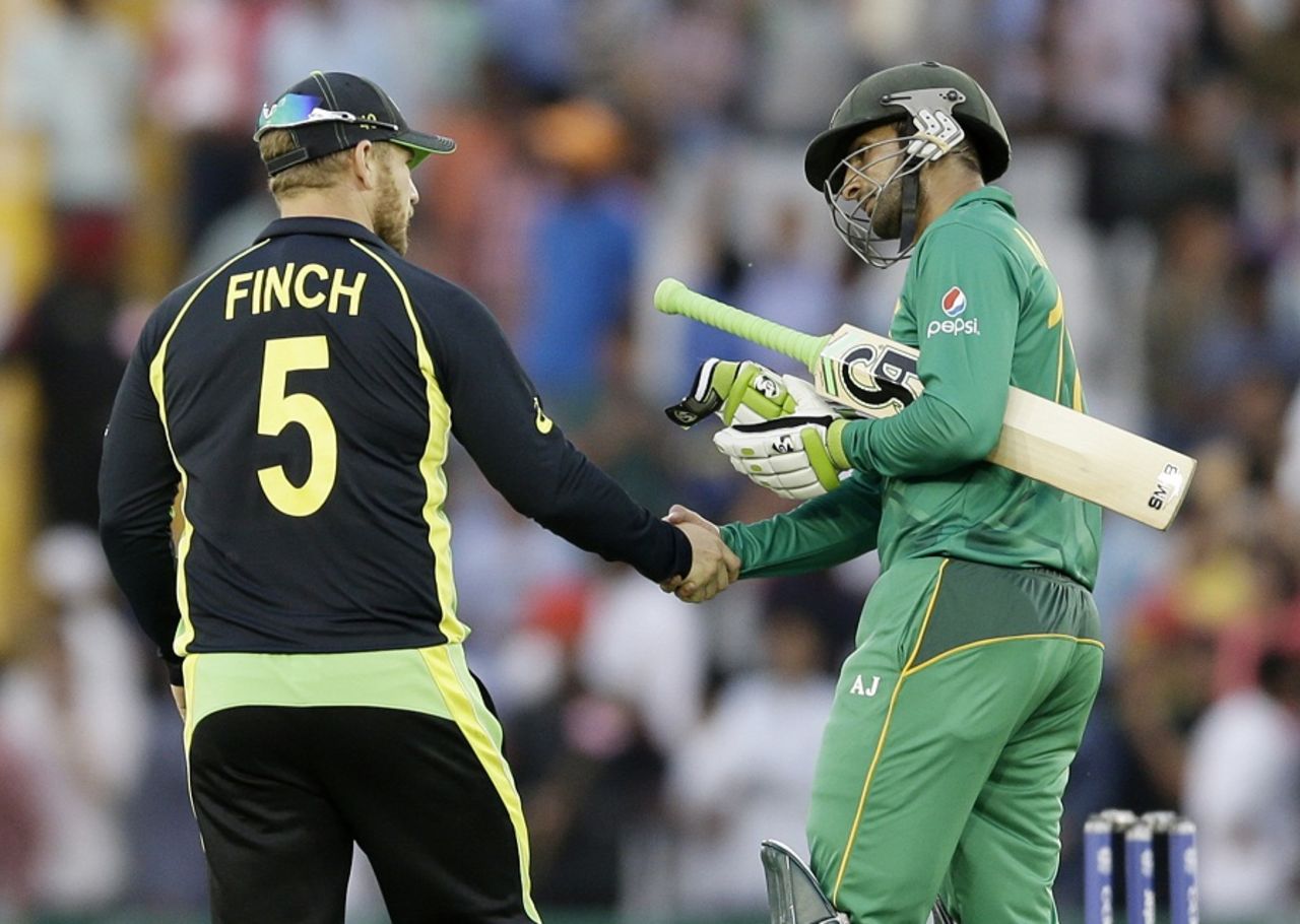 Aaron Finch and Shoaib Malik shake hands after the match, Australia v Pakistan, World T20 2016, Group 2, Mohali, March 25, 2016